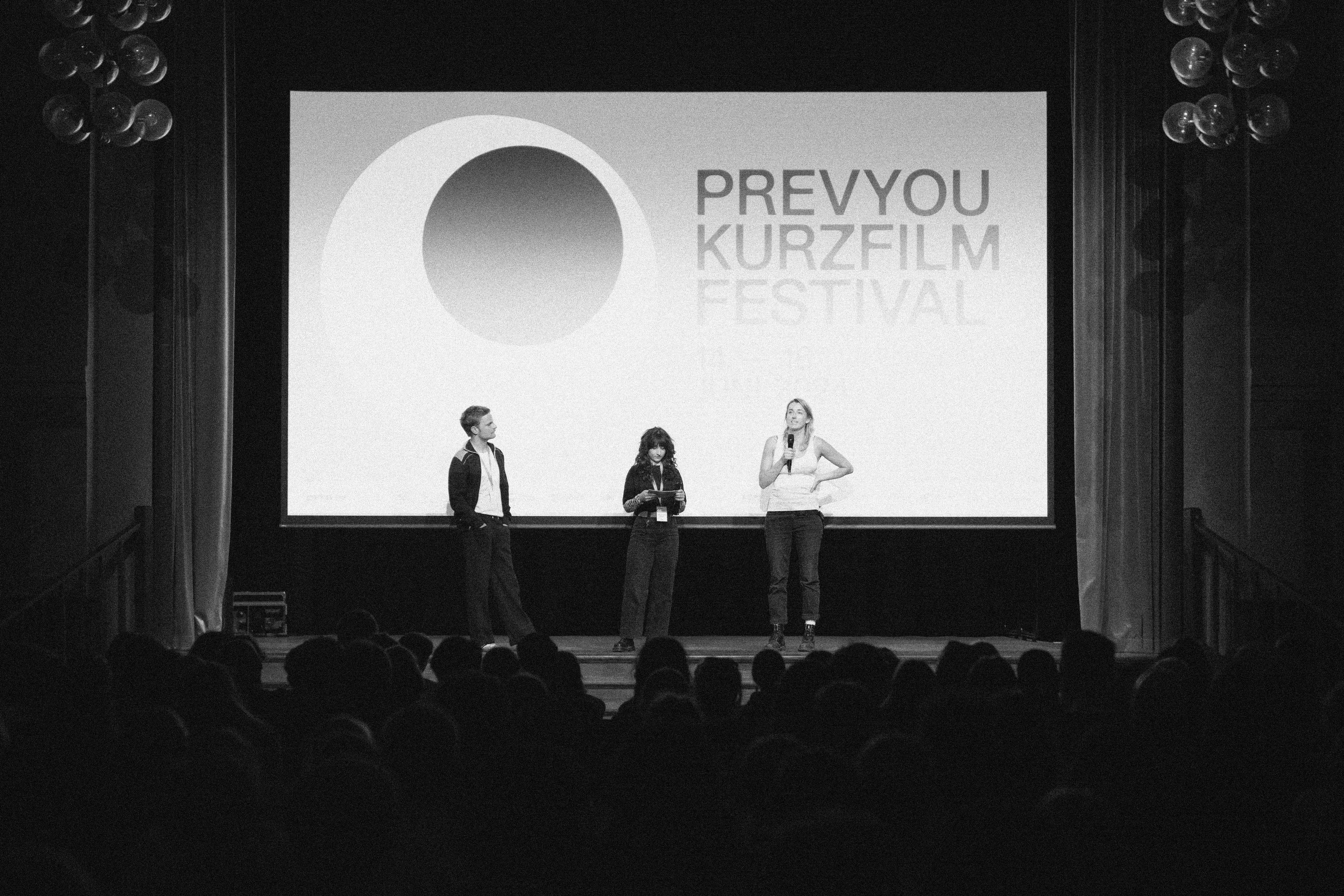 Festival stage with presenters